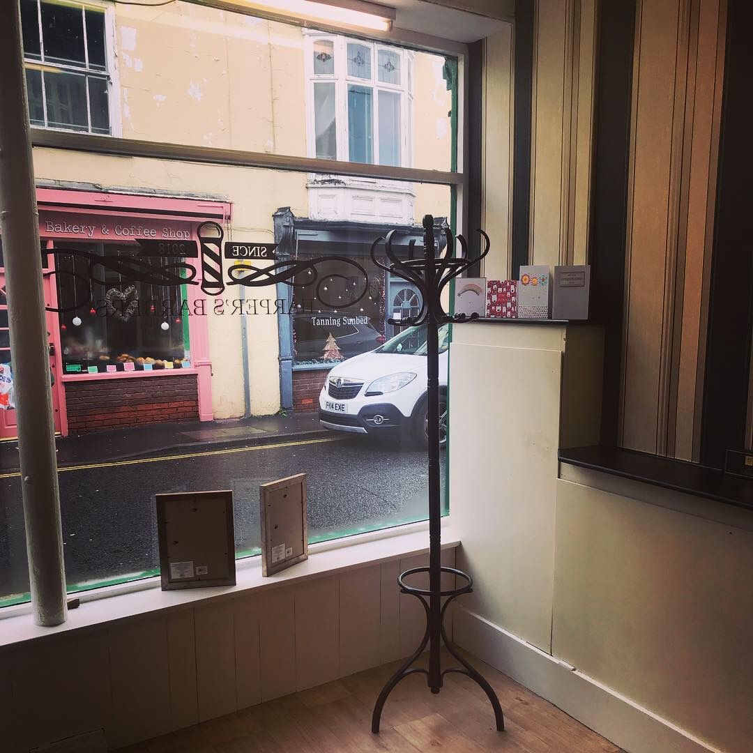 Looking out of the shop window onto Queen Street